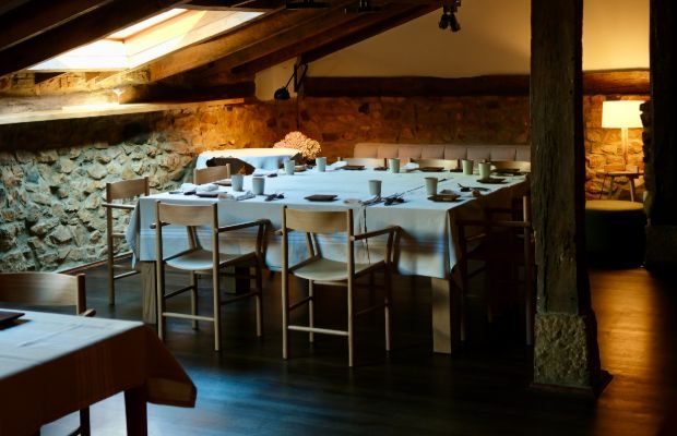 A photograph of the dining room at Asador Etxebarri