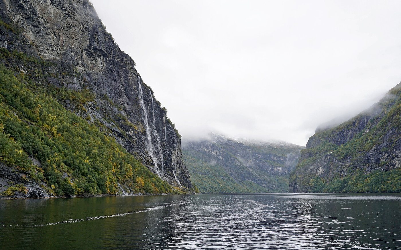 The Seven Sisters waterfalls flowing into Geirangerfjord, Norway
