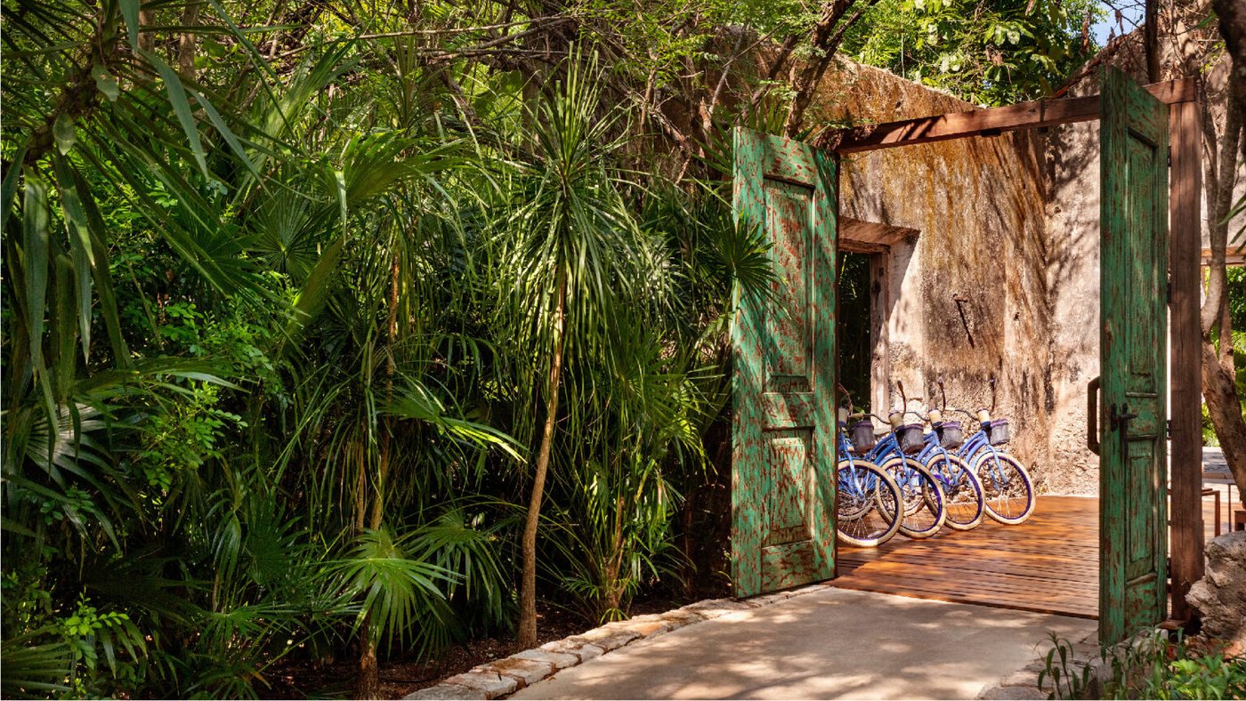 The jungle grounds and stone arches of Chablé Yucatán