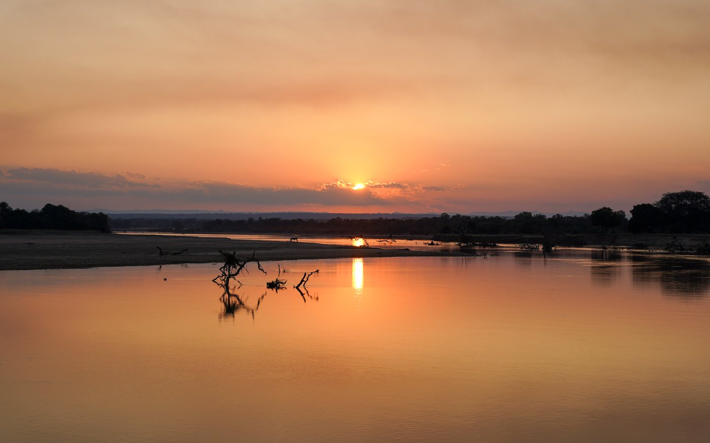 Wide view of the Luangwa River at sunset in South Luangwa National Park, Zambia