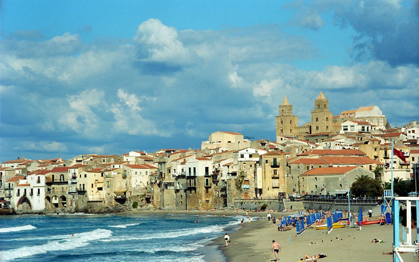 Cefalù, Sicily — the old town and Norman cathedral above the beach