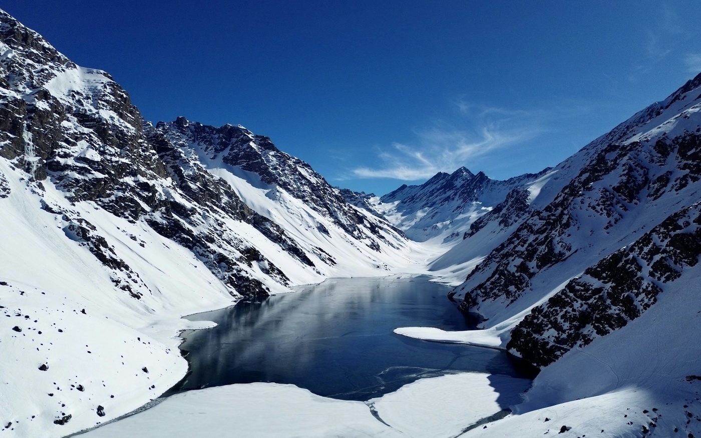 Snow-covered Andes mountains around Laguna del Inca at Portillo