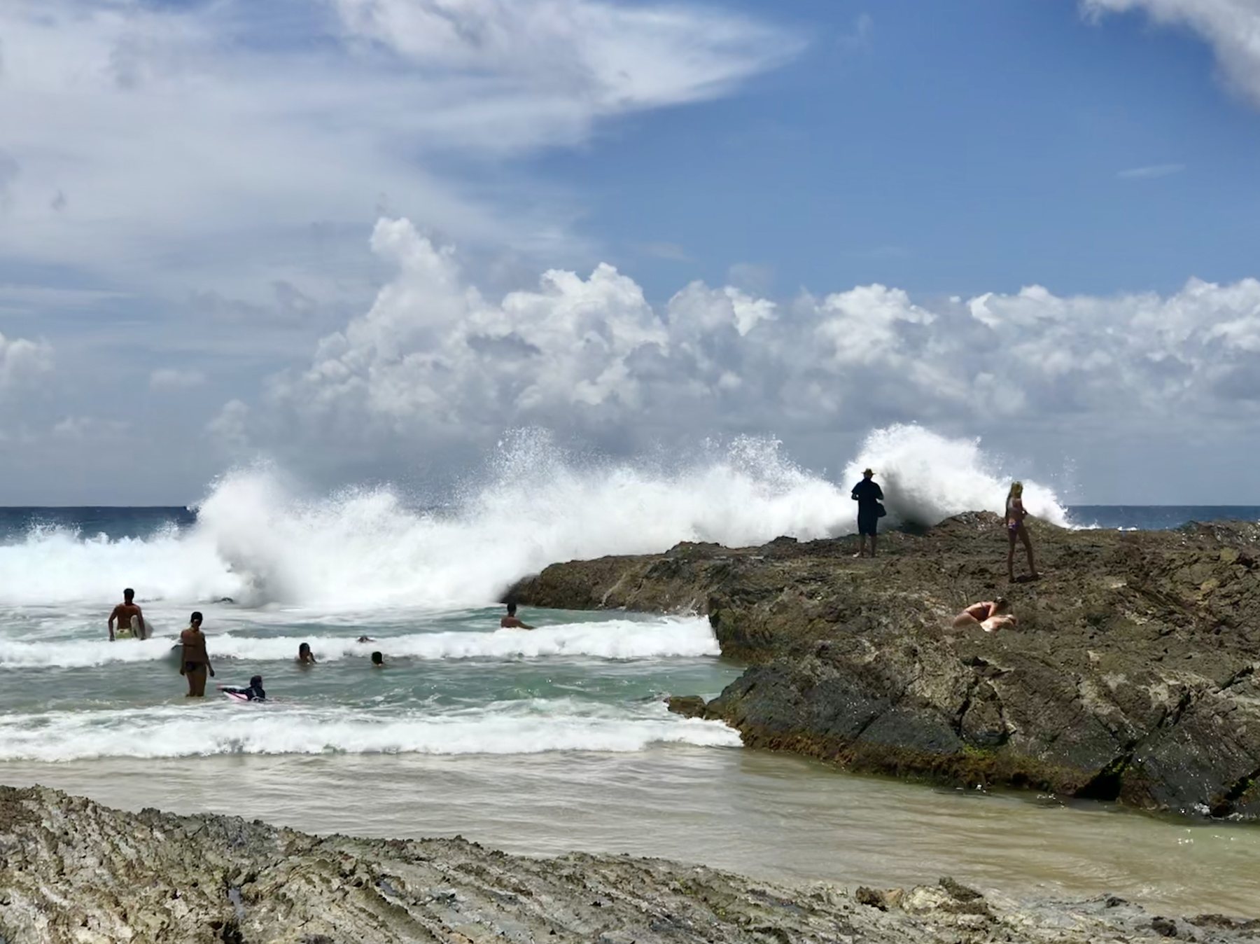 Waves breaking around Snapper Rocks at Coolangatta on Australia's Gold Coast