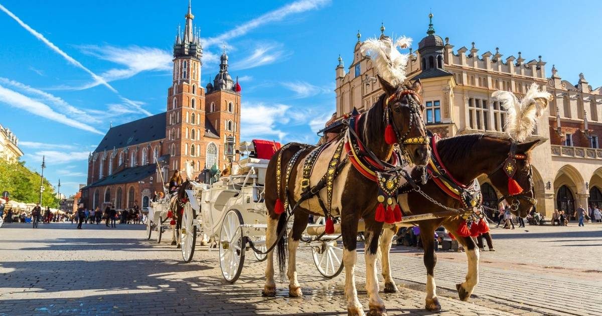 Kraków's Main Market Square with the Cloth Hall and St Mary's Basilica