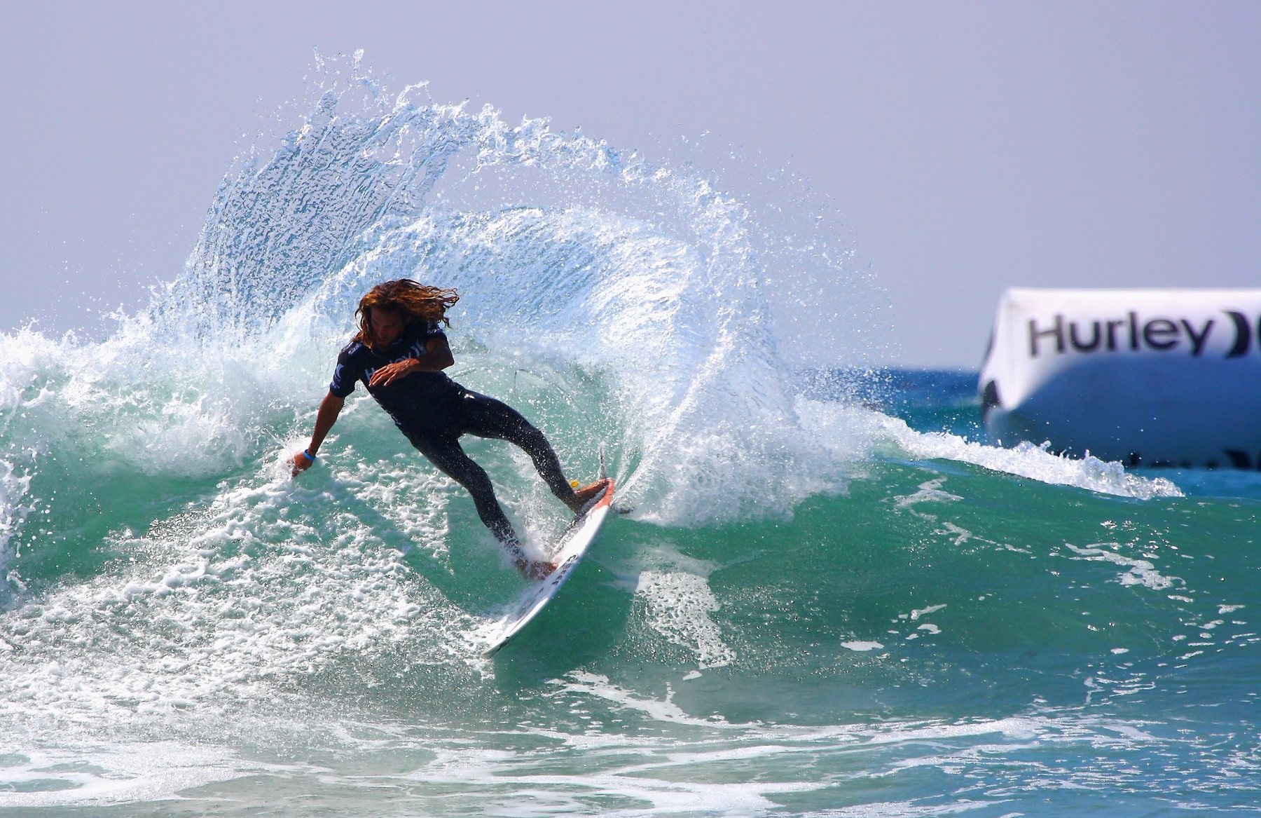 Surfer Rob Machado performing a cutback at Lower Trestles, California