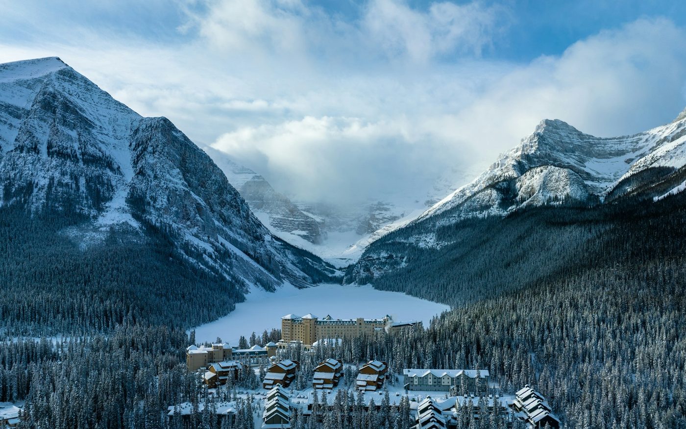 Winter view of the Lake Louise resort ringed by Rockies