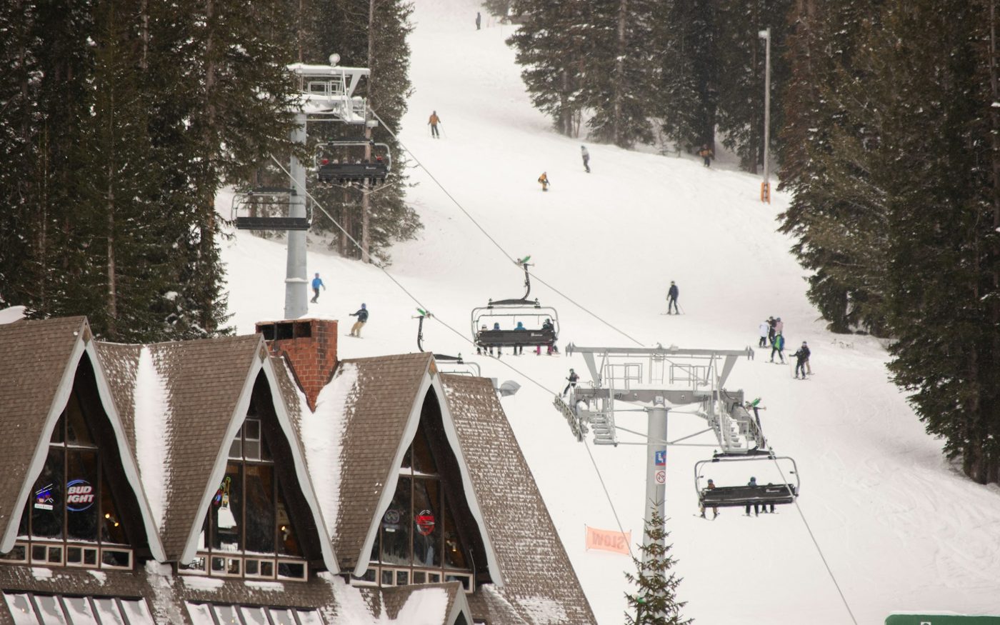 Ski lift climbing a snowy mountainside near Park City, Utah