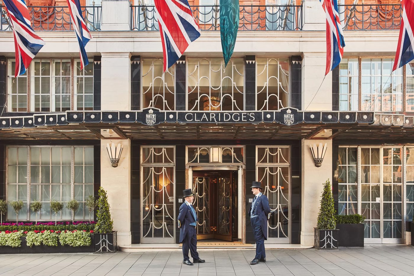 Doormen at the entrance of Claridge`s on Brook Street, Mayfair