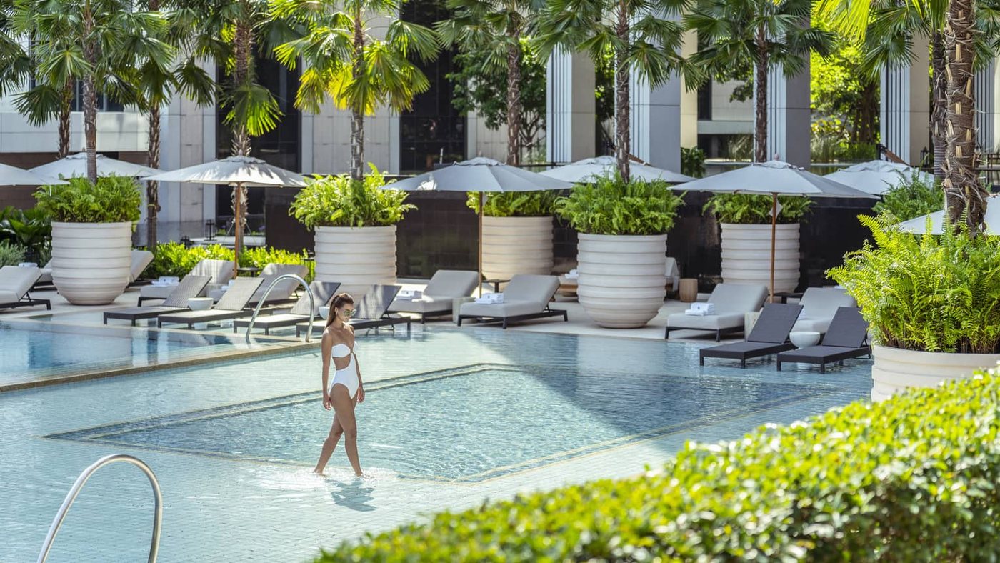 The riverfront pool terrace at Four Seasons Bangkok at Chao Phraya River